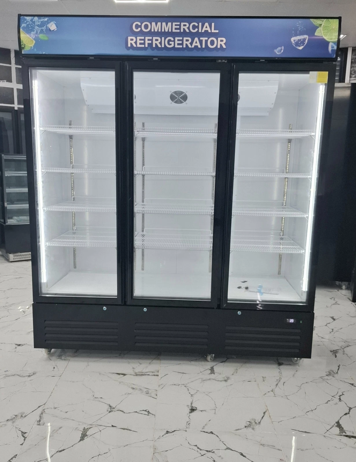 BRAND NEW COMMERCIAL TRIPPLE GLASS DOORS FRIDGE .. 1.8 METER