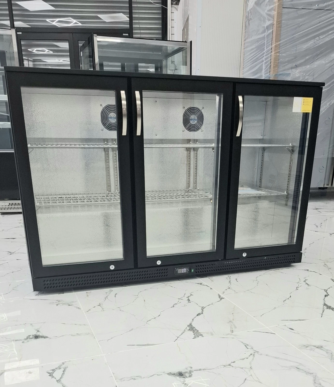 BRAND NEW 3 HINGED DOORS BACK BAR COOLER. SELF CLOSING DOORS.300 LITRES.